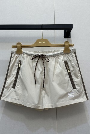 미우미우(MIU MIU) 나일론 지퍼 반바지 의류