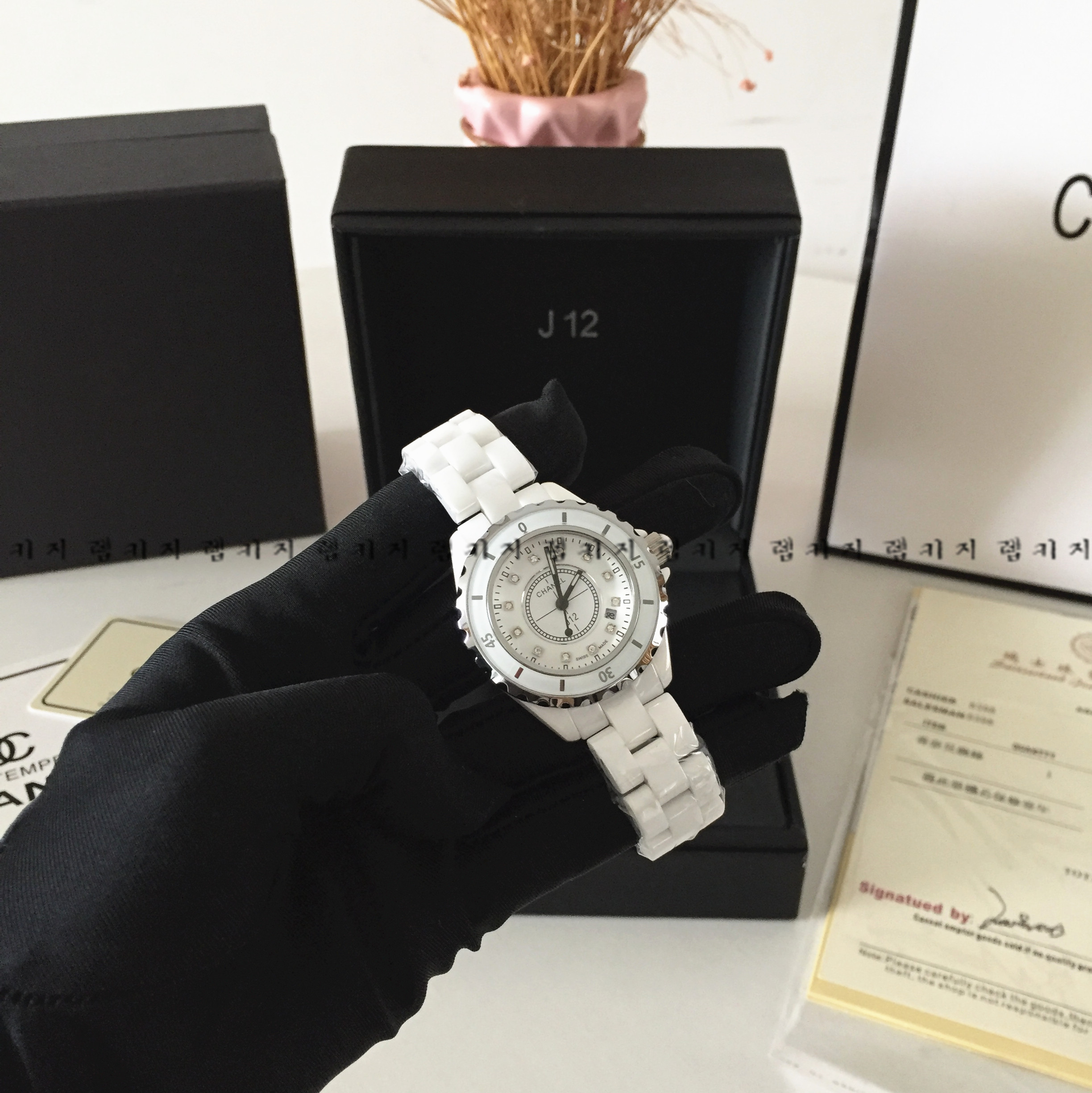 샤넬 J12 화이트다이얼 세라믹 시계
